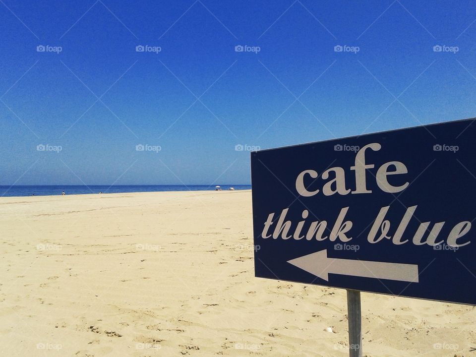 Beach cafe billboard in empty deserted beach. chill out ambience