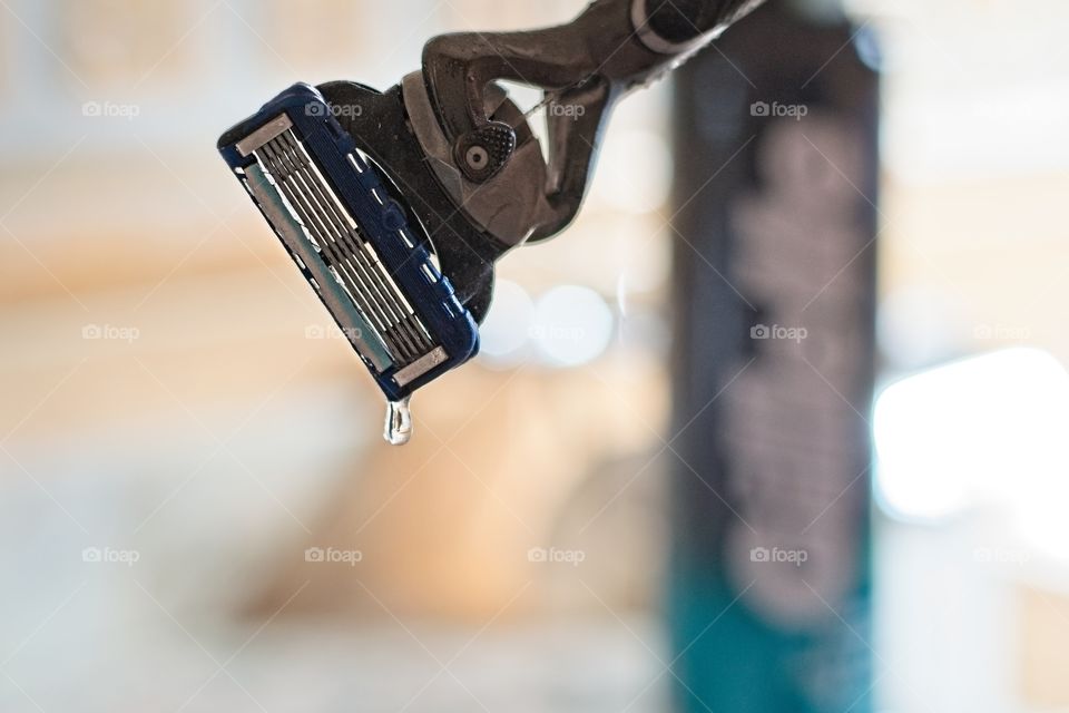 A razor drips during shaving