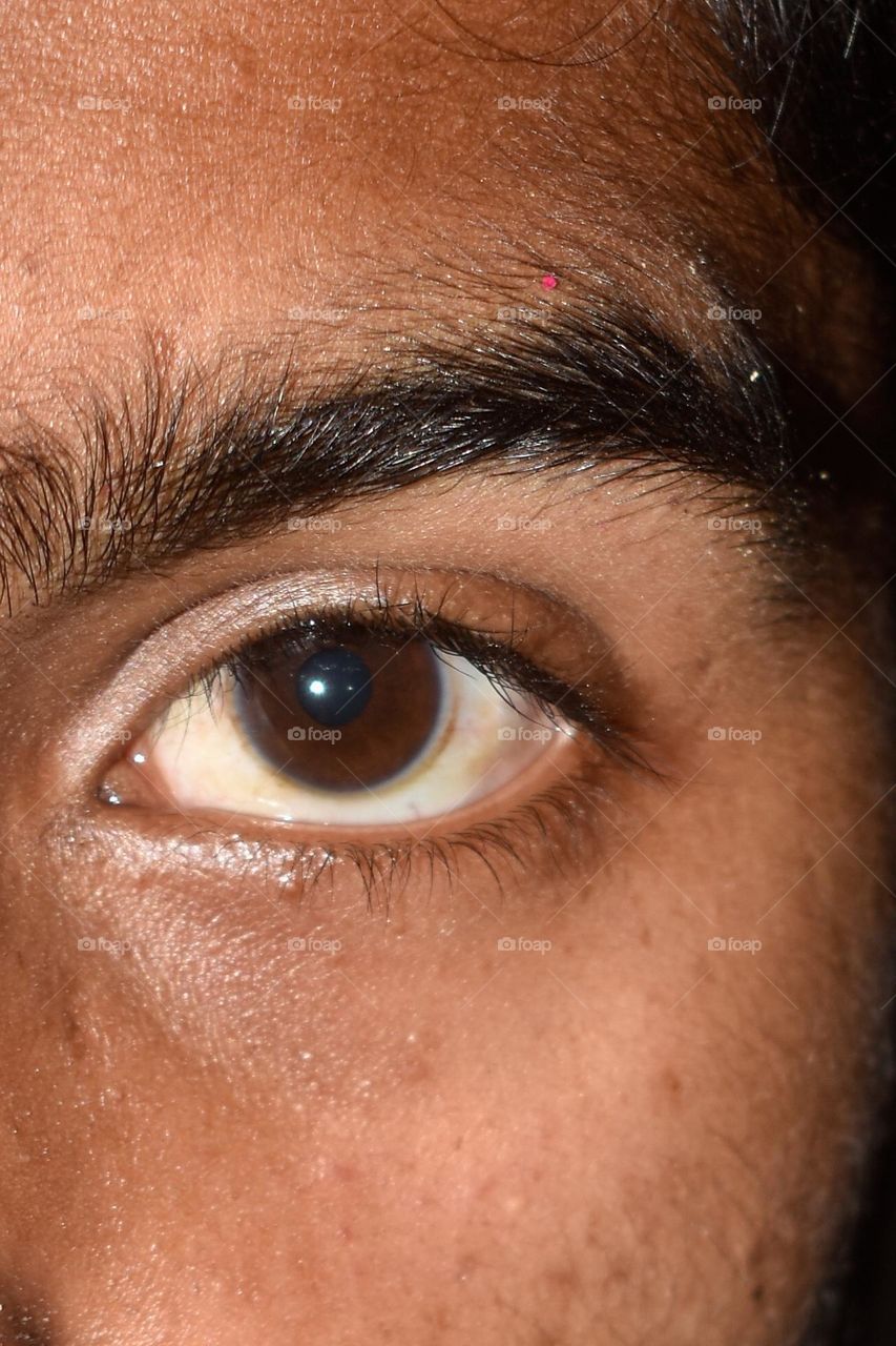 Angry eyes looks camera