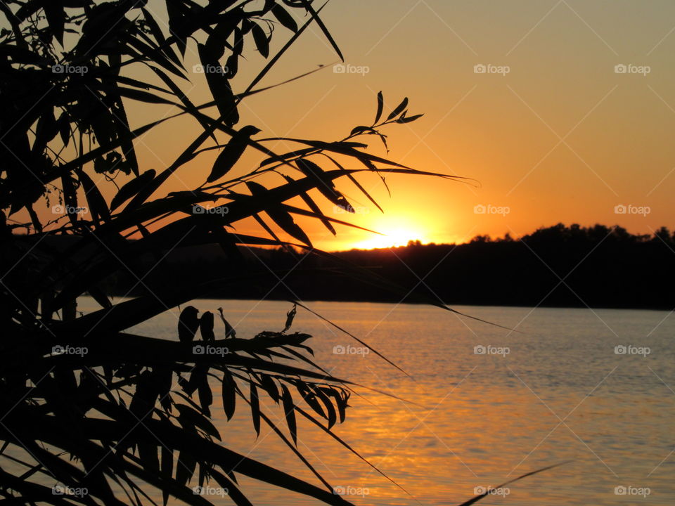 sunset on the Voronezh River in the city reservoir