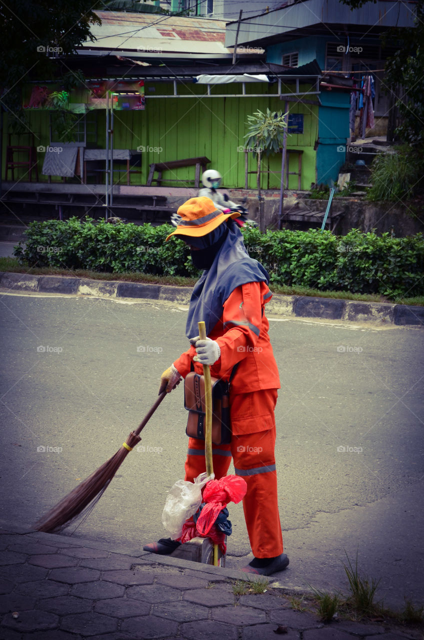 she works every day cleaning the city road, Happy labours day may 1 2019