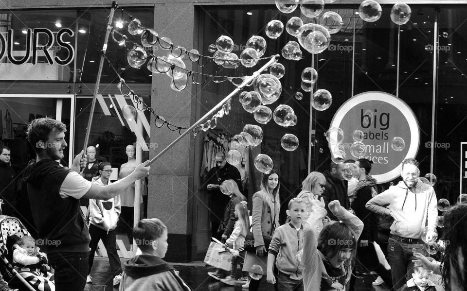 Blowing soup bubles in the Centre of Glasgow. Its AN amazing fun for children