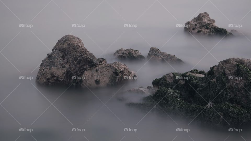Mountain Top or Rocks Above Water?