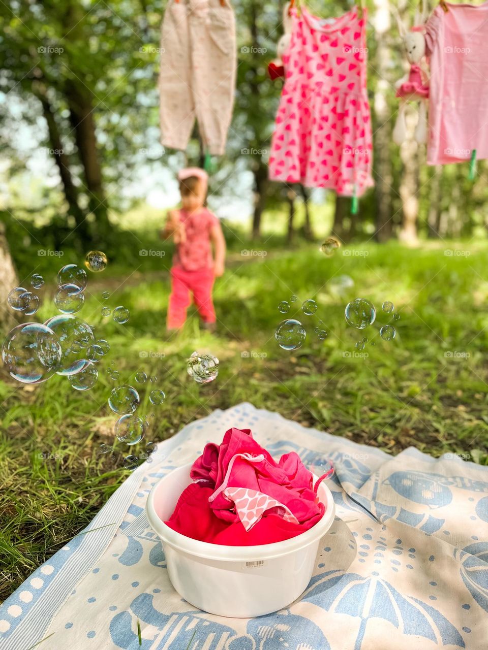 A little girl during a grand wash