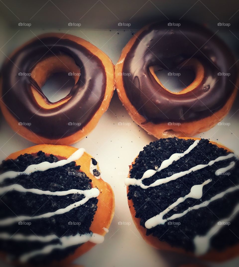 Dark rich chocolate and Oreo donuts 