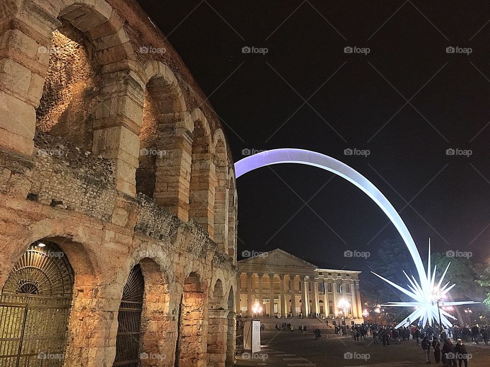 Arena di Verona enlightened by a comet star.