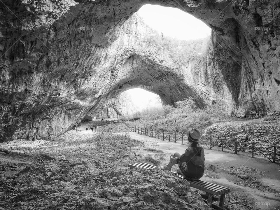 Girlfriend enjoying the view in Devetashka cave Devetaki,Bulgaria.