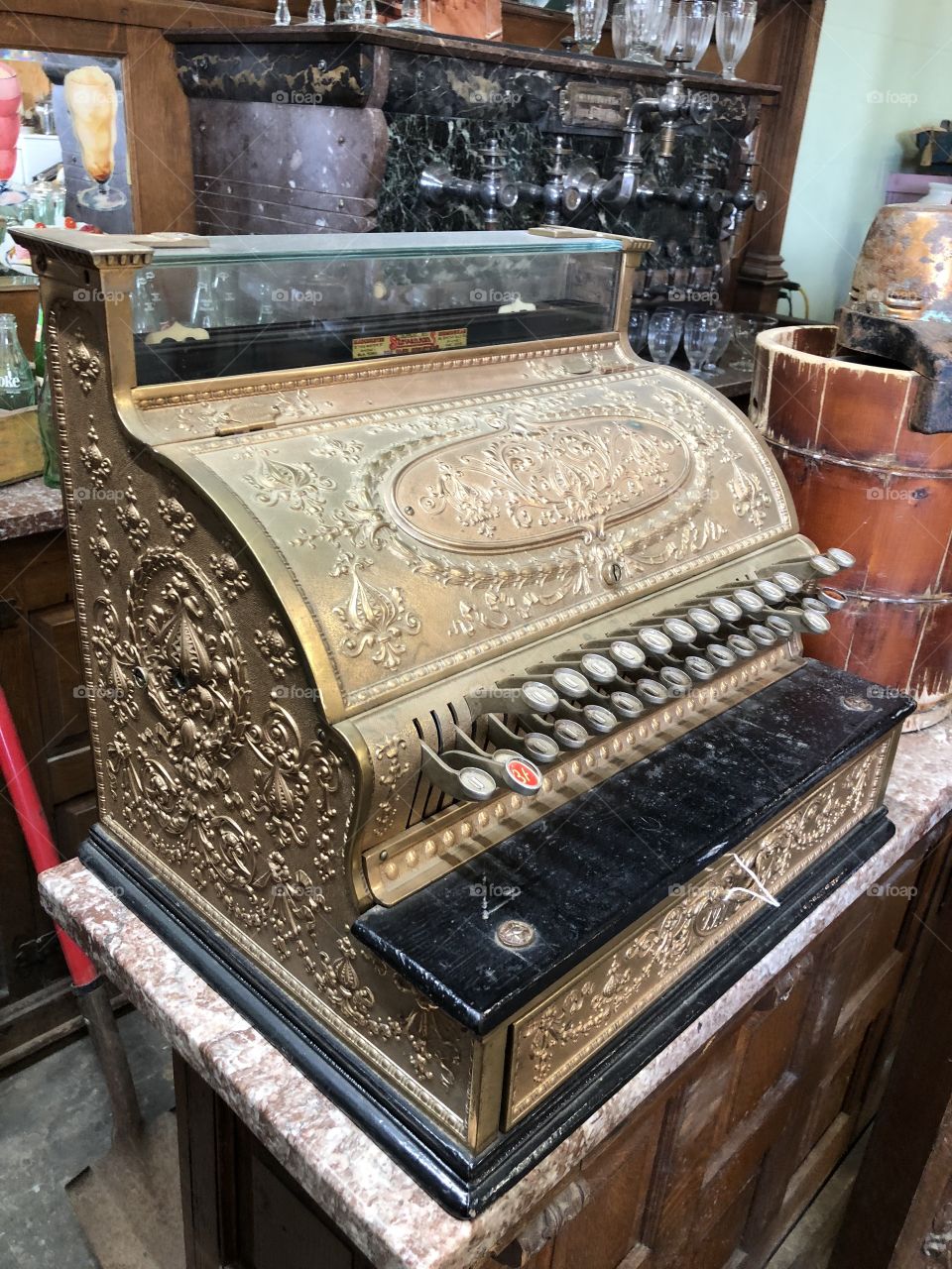 Brass cash register from days gone by. 