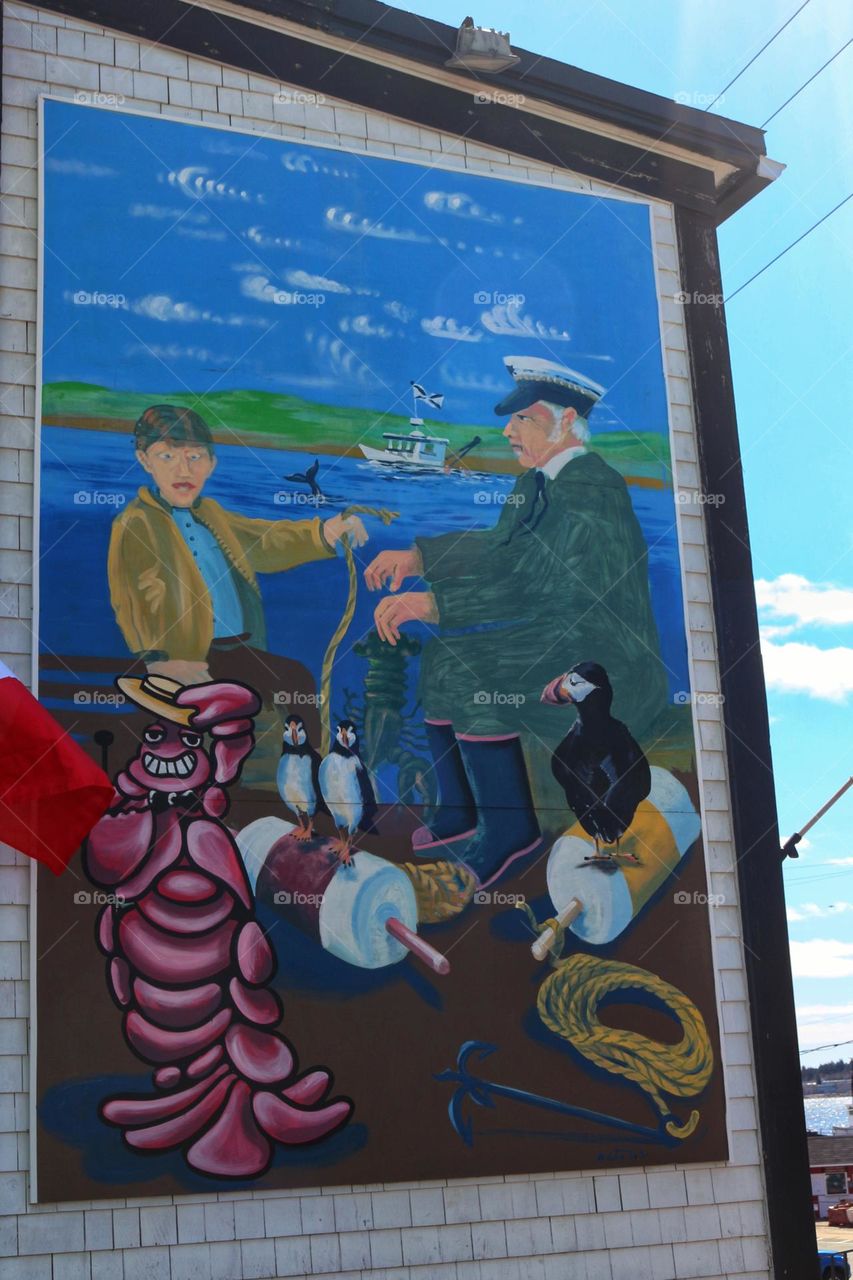 Maritime street art- fisherman mural.