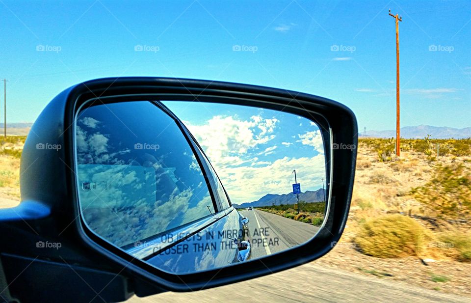 Sideview Mirror reflections. Desert sky reflected in Sideview mirror!