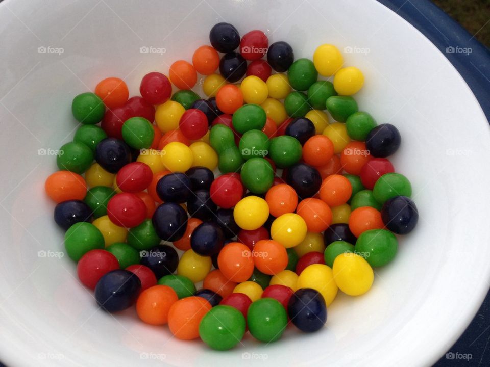 a bowl of colorful candies