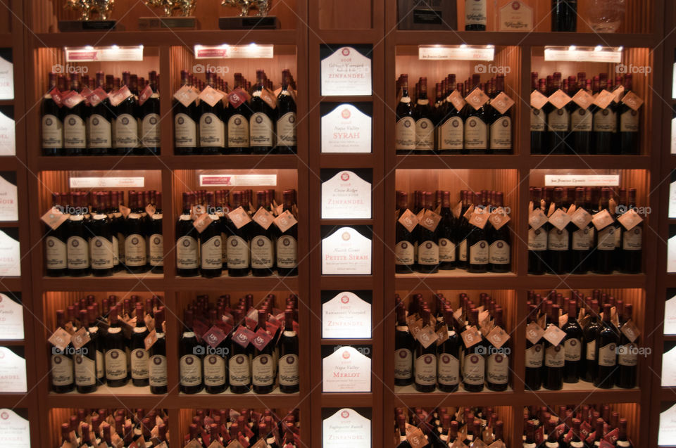 Fancy Wine. A cabinet full of wine in one of the fine Wineries jn Napa Valley, CA