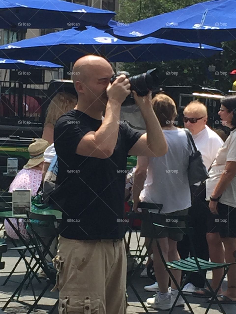 Photographer in the Crowd