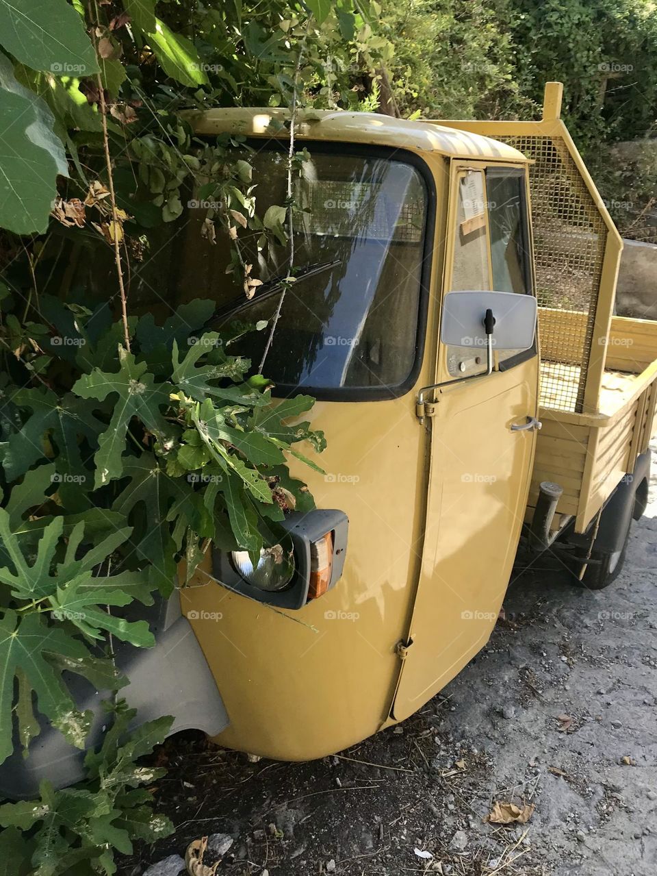 Found this yellow Piaggio Ape which may have been permanently parked on a hike up to Ravello Italy.