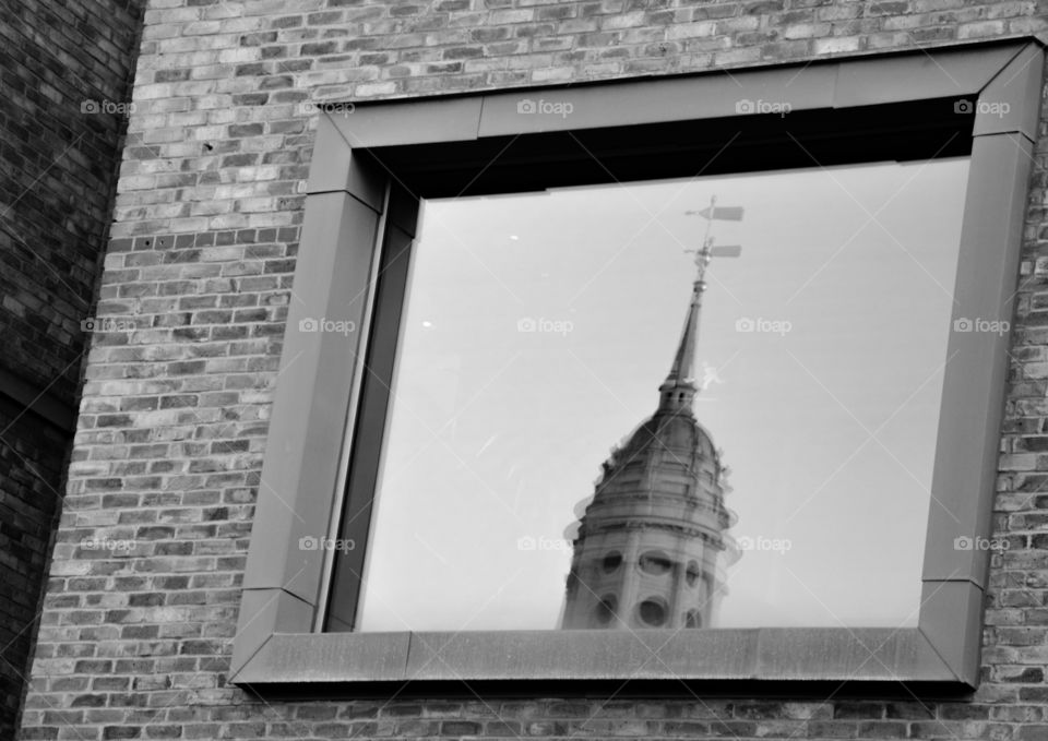 Bell Tower reflection in window