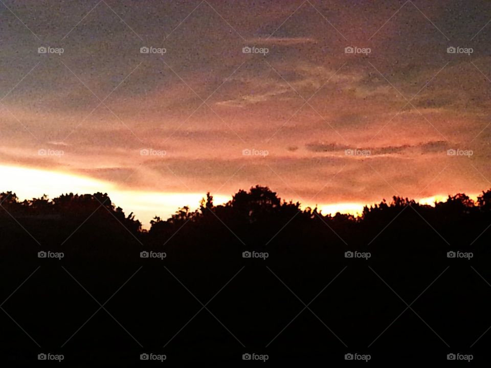 Sunrise Greets Summer Storm. Sunrise In Missouri during a Thunderstorm