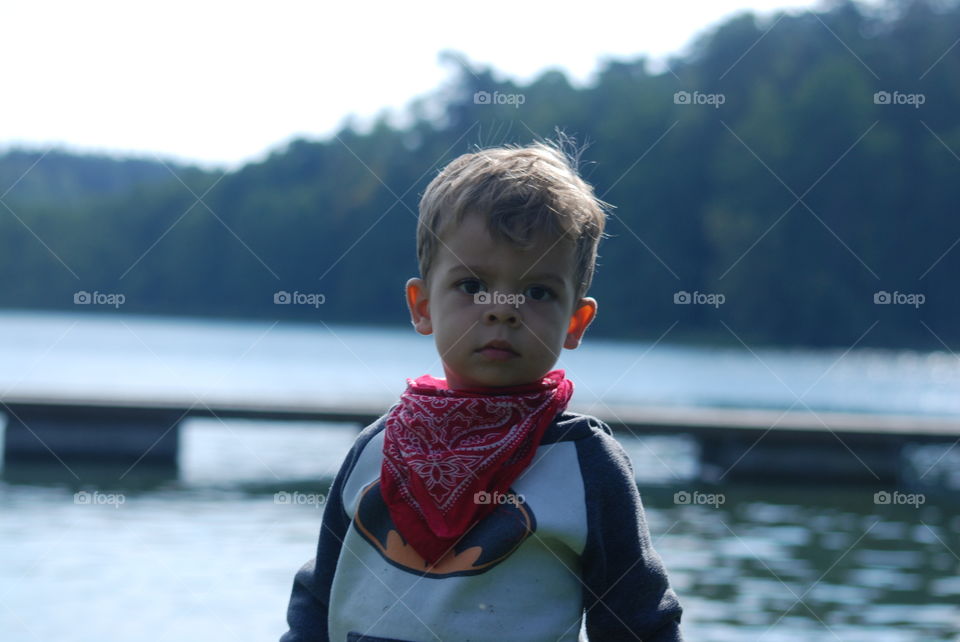 Portrait of a boy near the lake