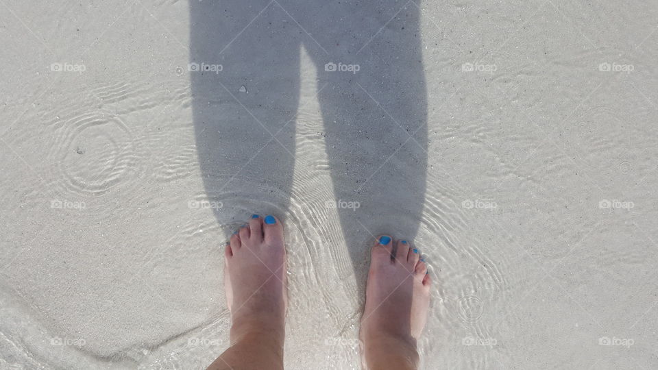 walking into the ocean. enjoying the sand beneath my feet.