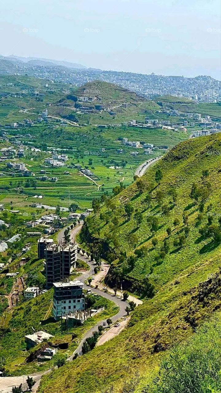 Glory be to God, the magnificent and picturesque view and the natural green trees are a view that is nothing more wonderful than it