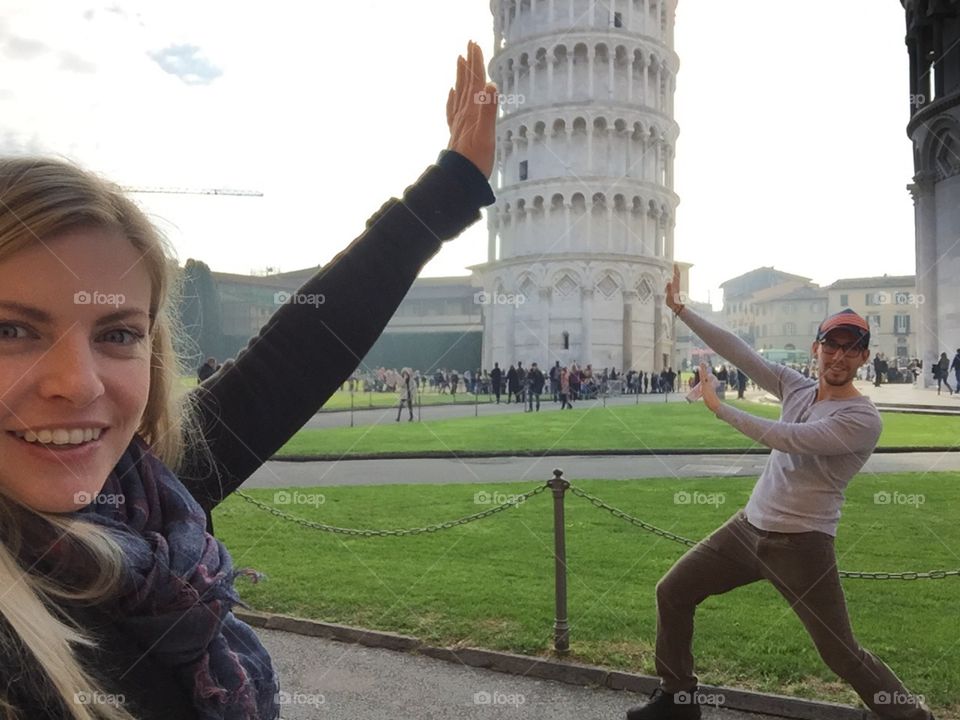 HOLDING UP TOWER