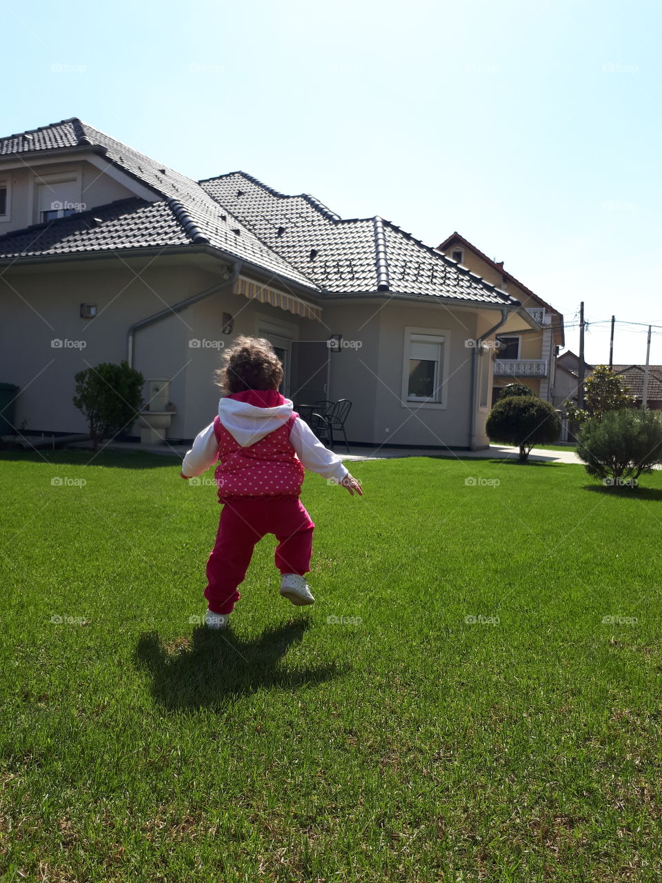 Baby girl running