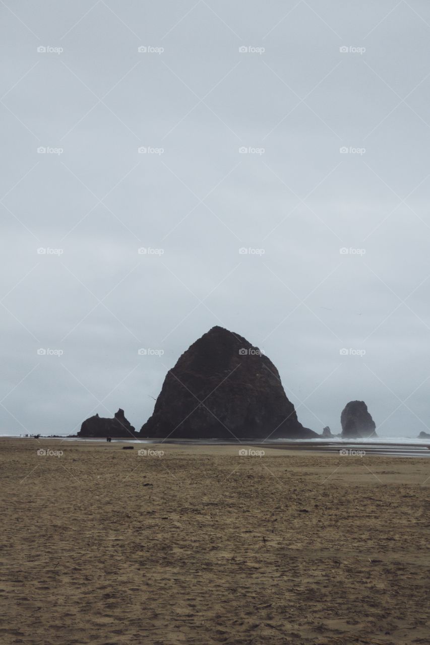 Haystack . This is the infamous haystack rock in Cannon beach, Oregon 