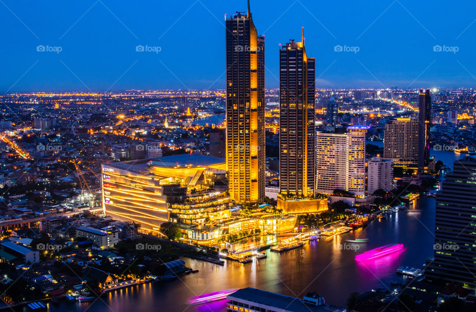 View to the impressive Cityscape of the Metropolis City Bangkok in Thailand Southeast Asia in the Night Timeline
