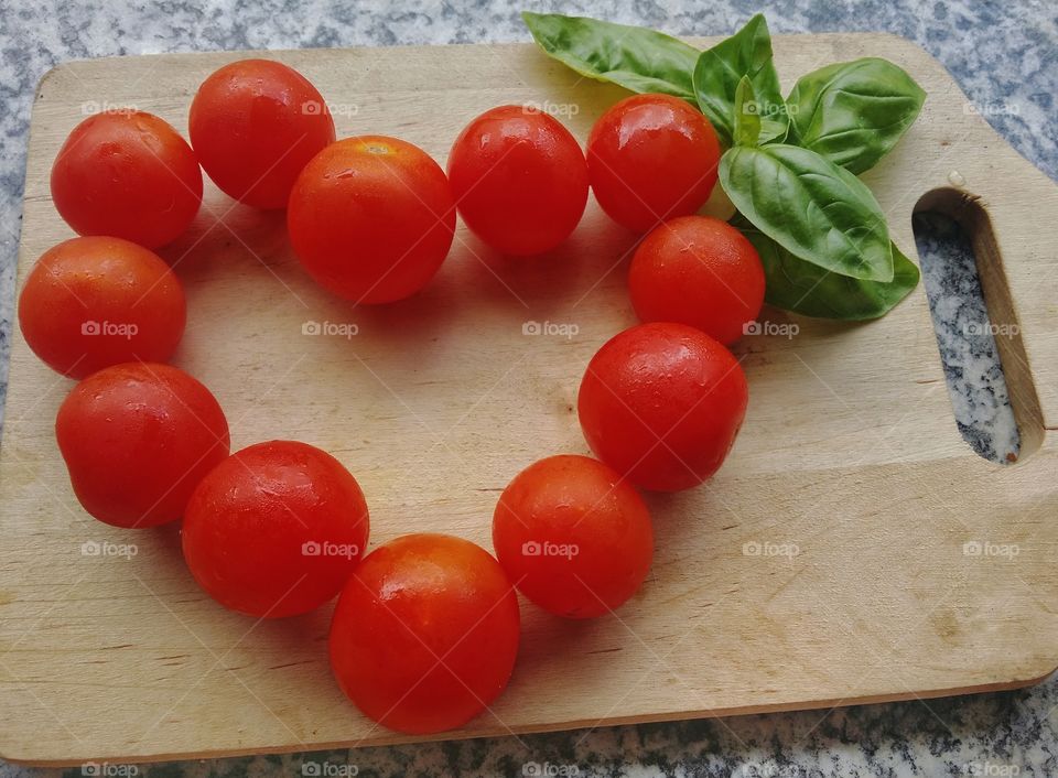Another of my passions: cooking! These are cherry tomatoes with basil, a must in many Italian recipes.