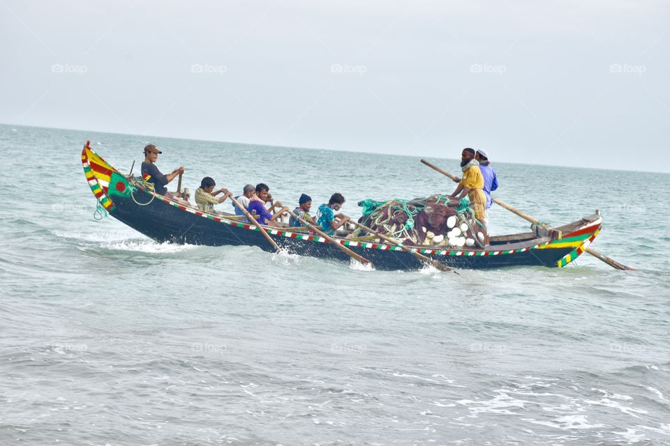 Fishermen go through the ocean for catching fishes for leading their lives and families.                                            A sudden Click but much more satisfying to watch ! 