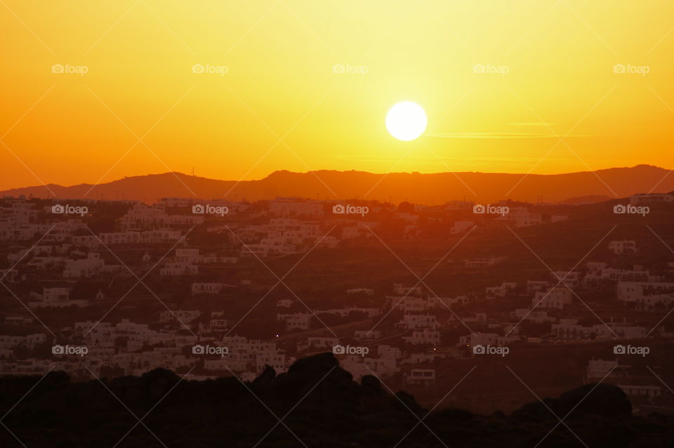 Mykonos Sunrise 2 - Sunrise over the city of Mykonos, Greece.