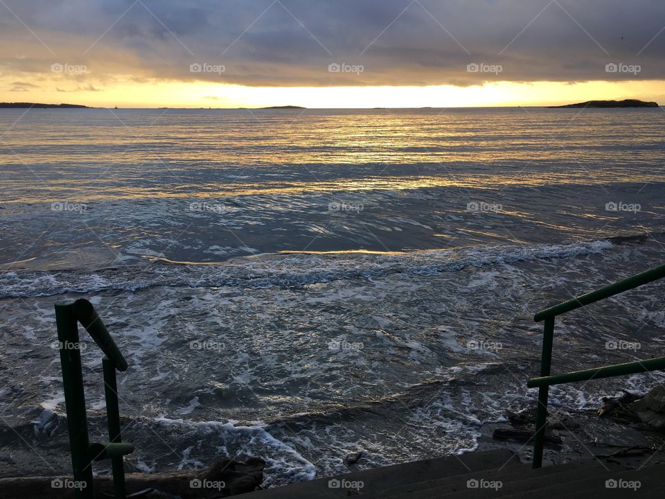 View of empty steps at sandy beach