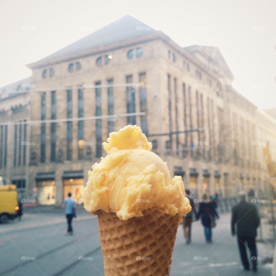Ice Cream on the street. Having this mango flavor ice-cream  in the cold weather.