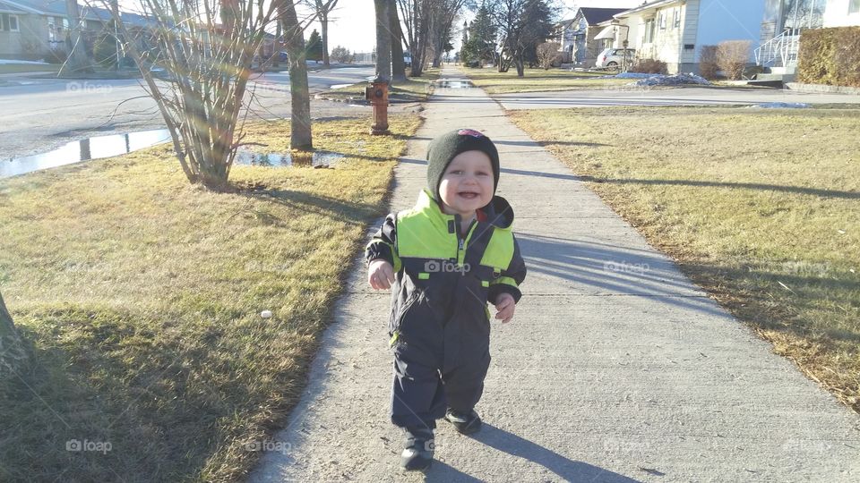baby running. spring and one of the first times he had a chance to run outside