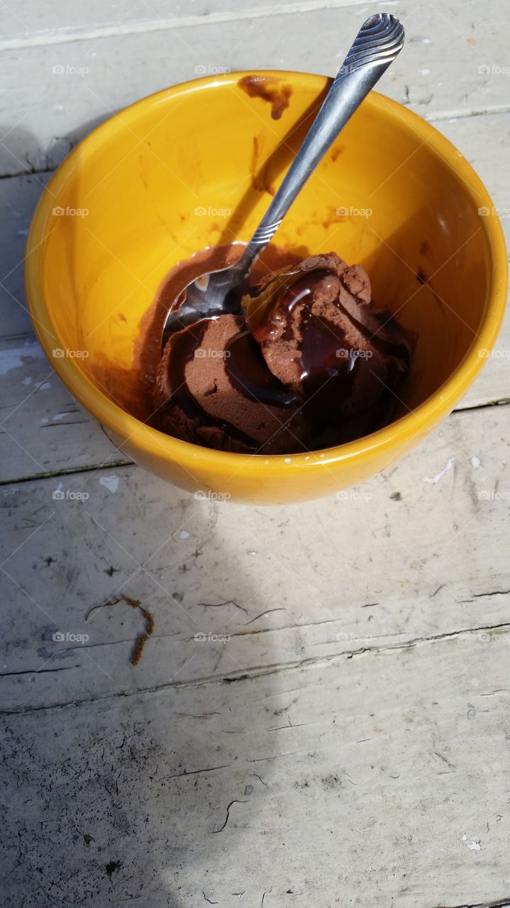 yummy ice cream in a yellow bowl