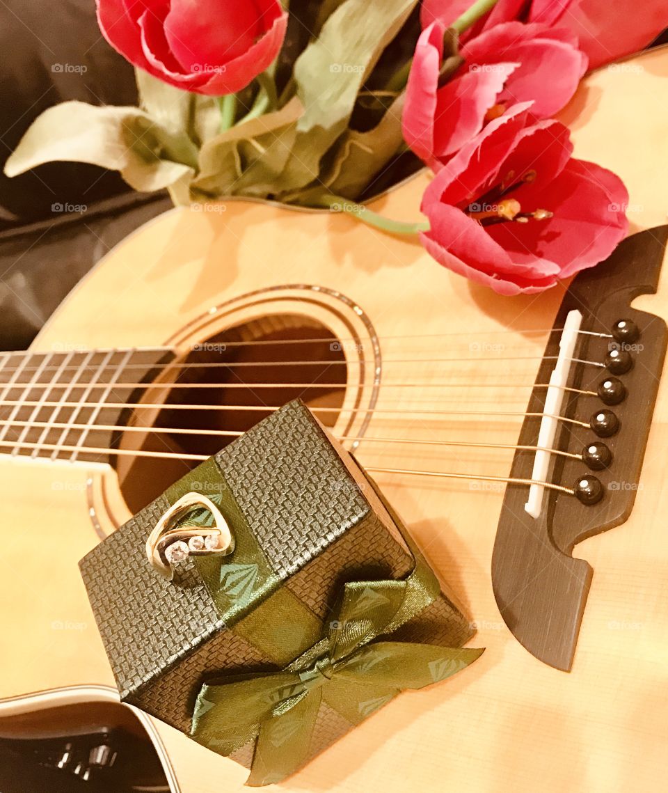 Taking a weekend getaway to propose to the love of my life by serenading her with my guitar! 