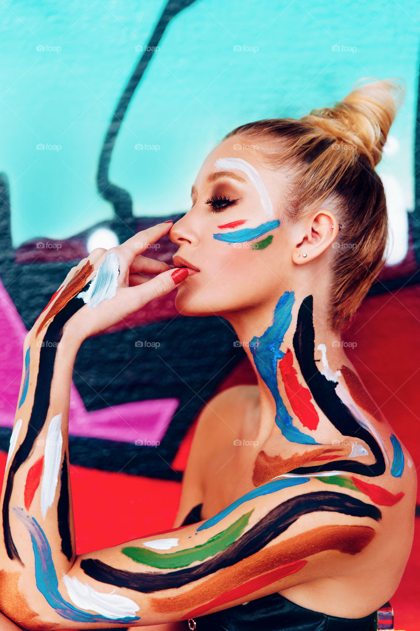 Colors ,colors and more colors ..some body paint and an abandoned building downtown filled with beautiful graffiti art 