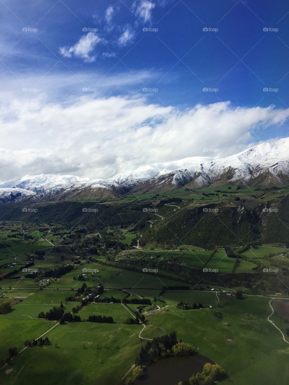 Beautiful view of the Southern Alps from Air New Zealand airplane 