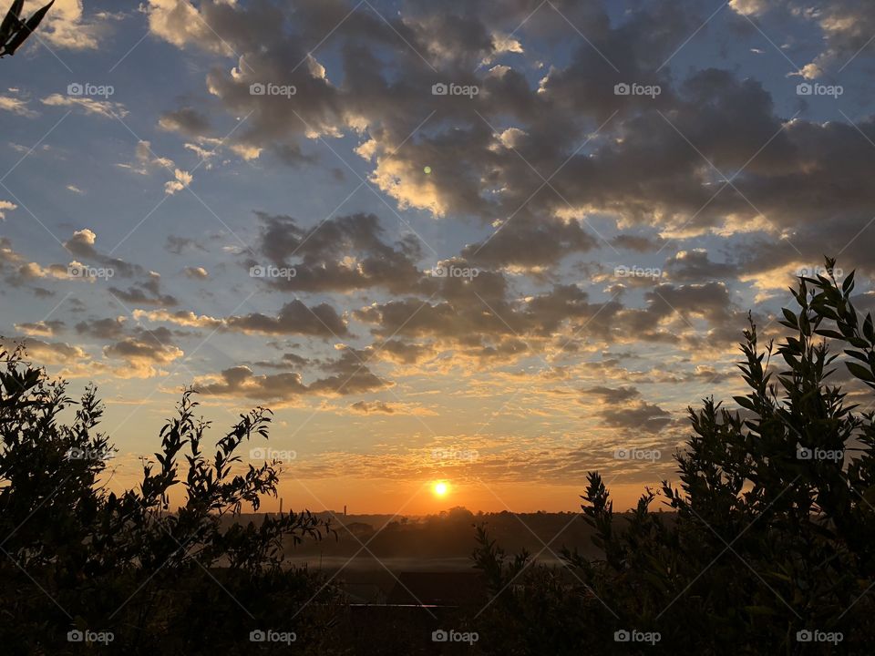 Sunrise viewed from the city, in the country. If for nothing else, day breaking like this is a great reason to get up early for the day...