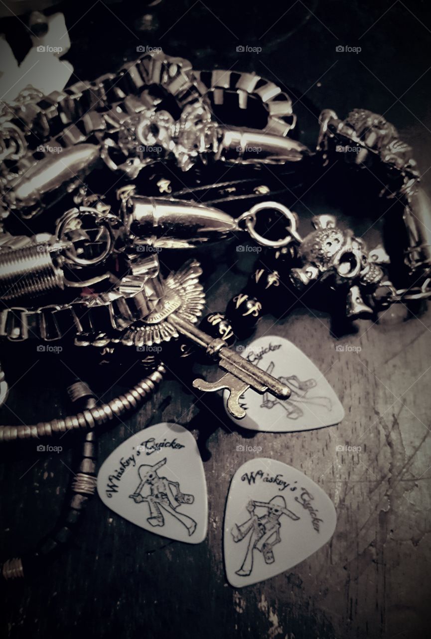 Whiskey's Quicker guitar picks and jewelry