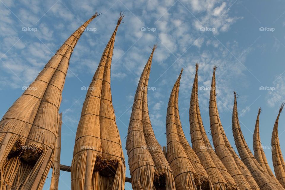 Row of Straw Boats Against Blue Sky, Huanchaco, Peru