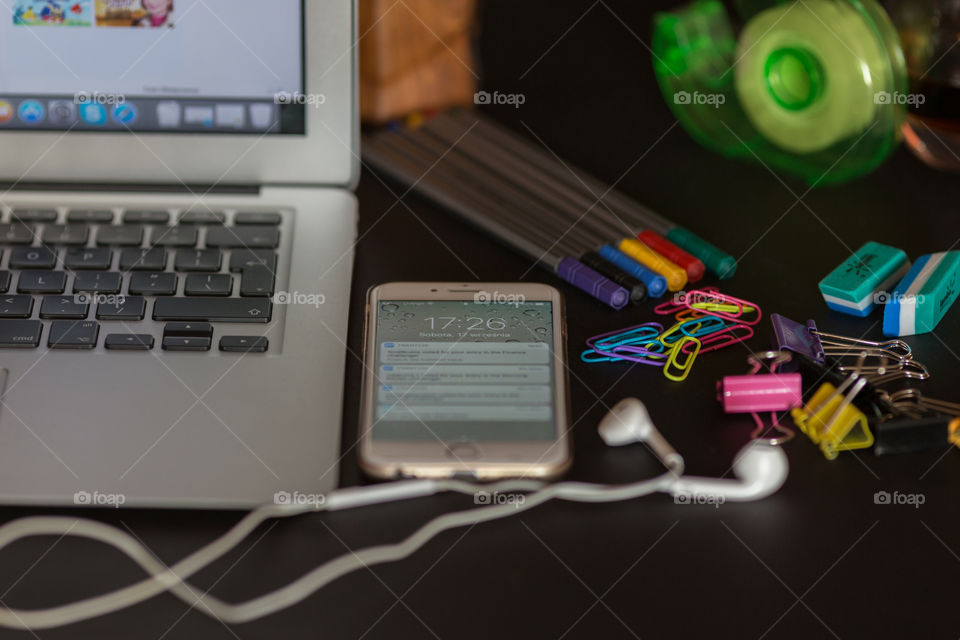 laptop and phone on the desk