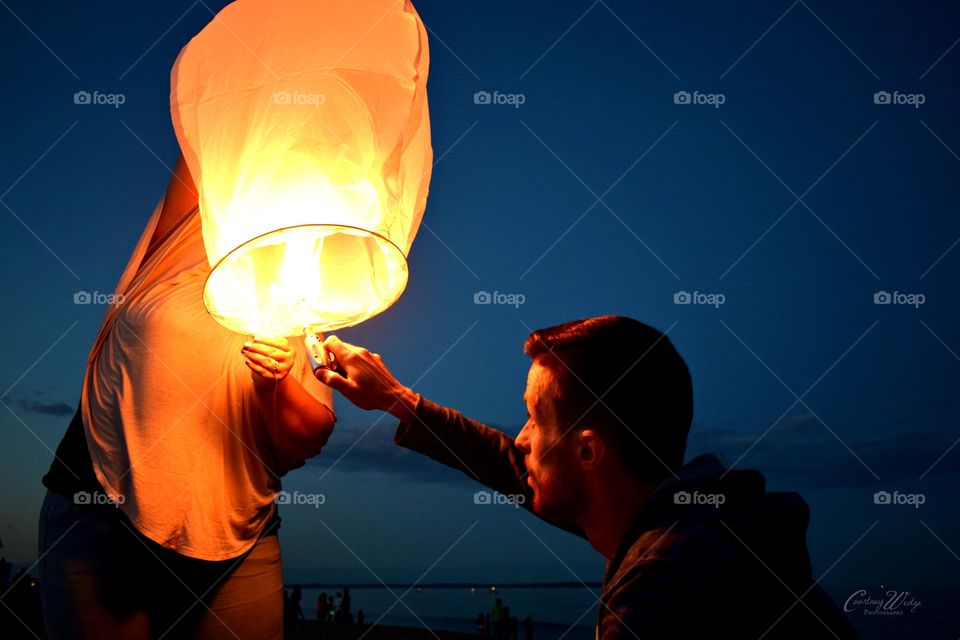 Lighting a Paper Lantern
