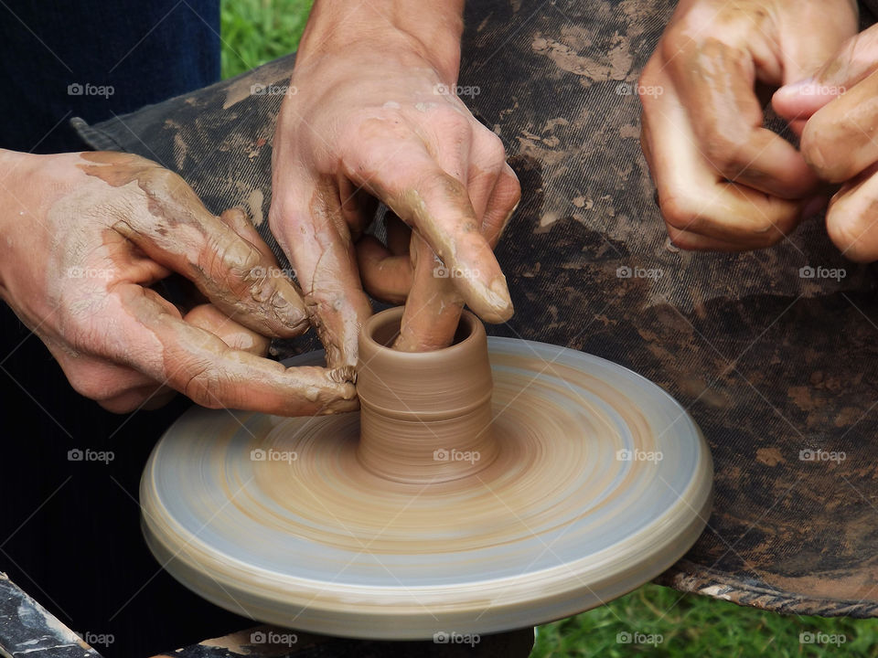 Person's making pottery