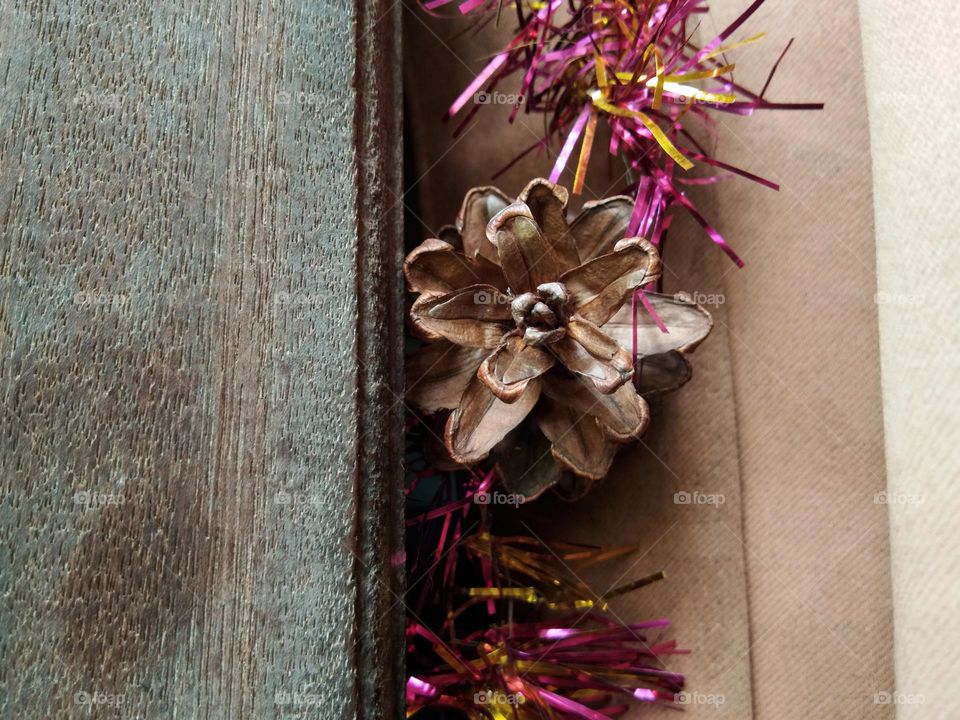 pine cone and shiny tinsel, Christmas decoration