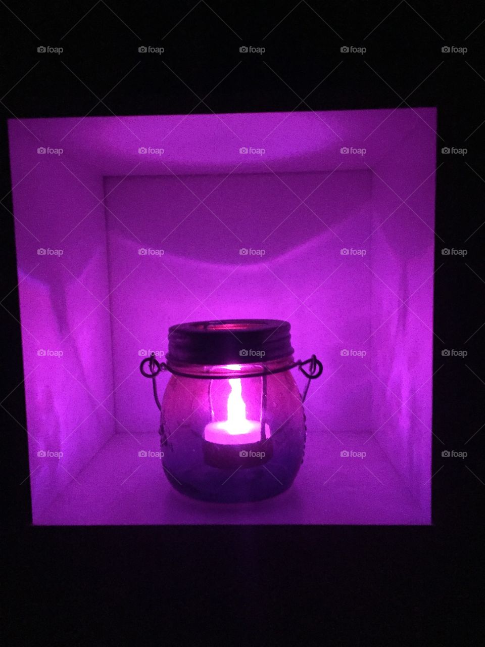 Close-up of candle in purple box