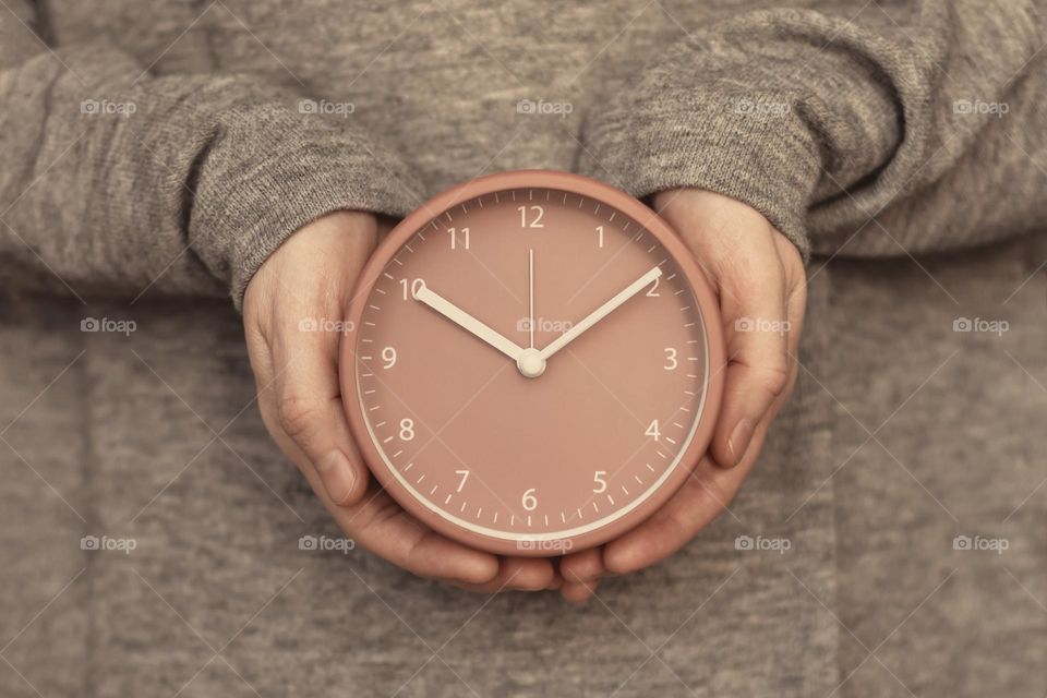 Human hands holding watch. Concept of time.