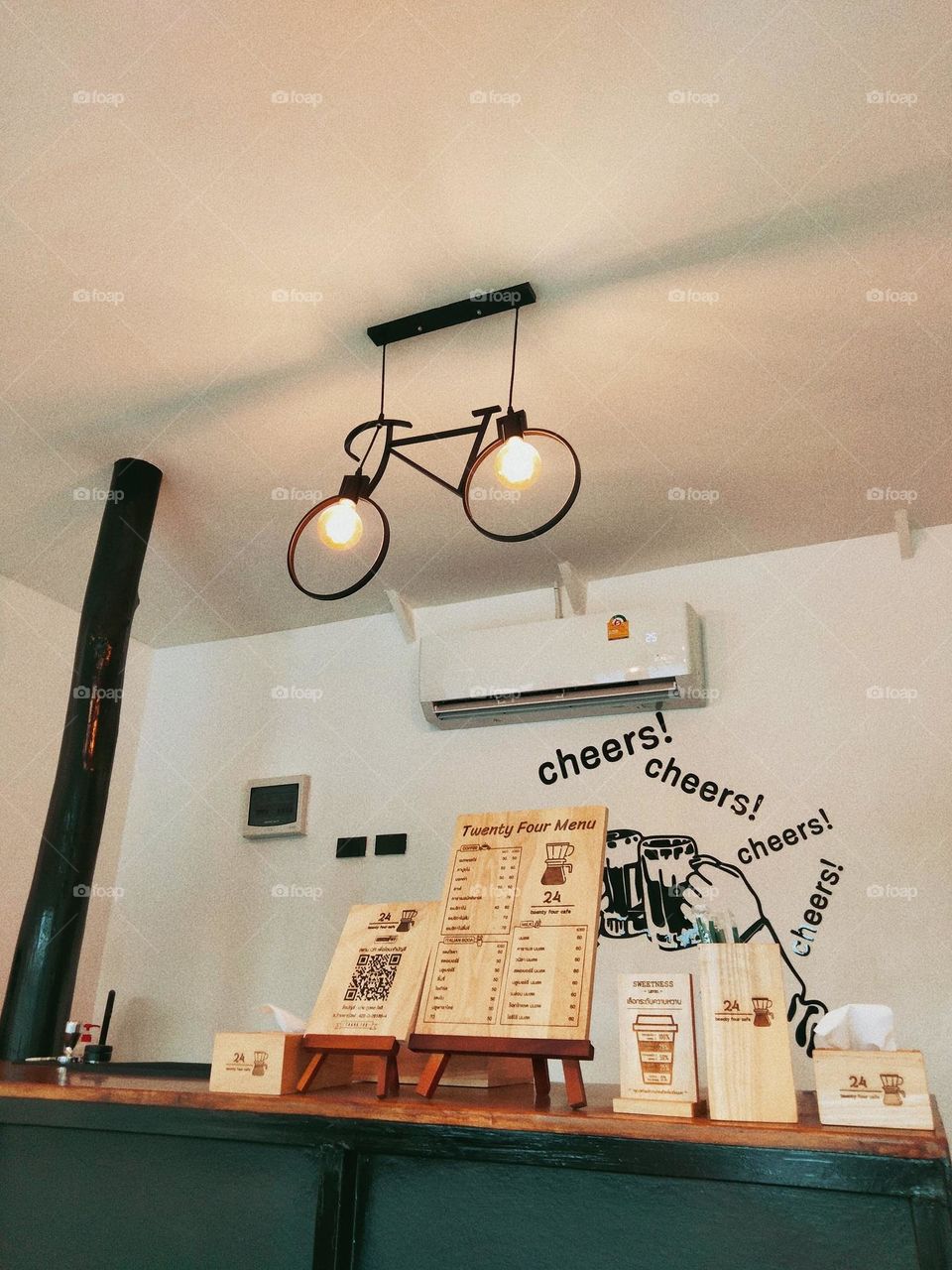 I'm waiting for the cafe owner to come out to greet me.