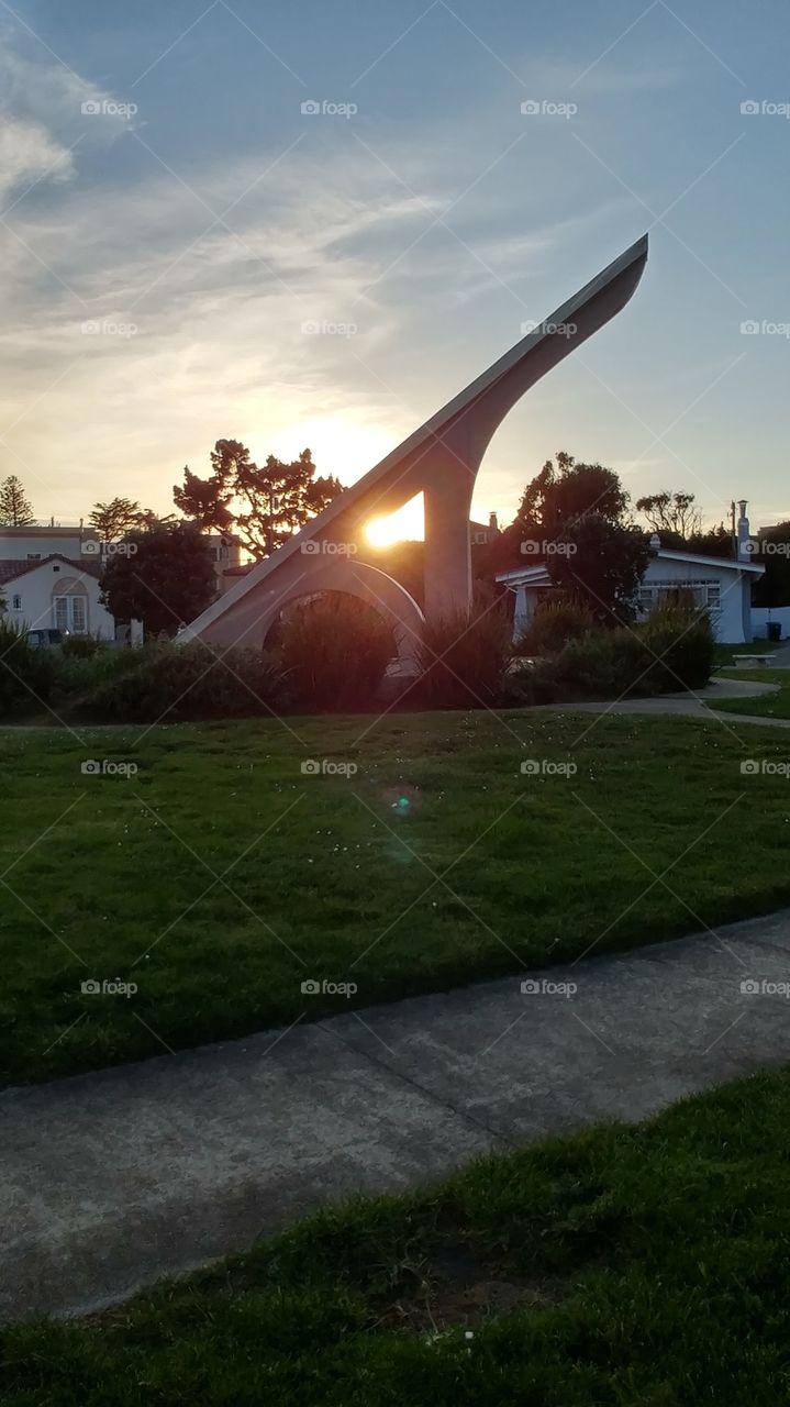 sun dial in the suburbs