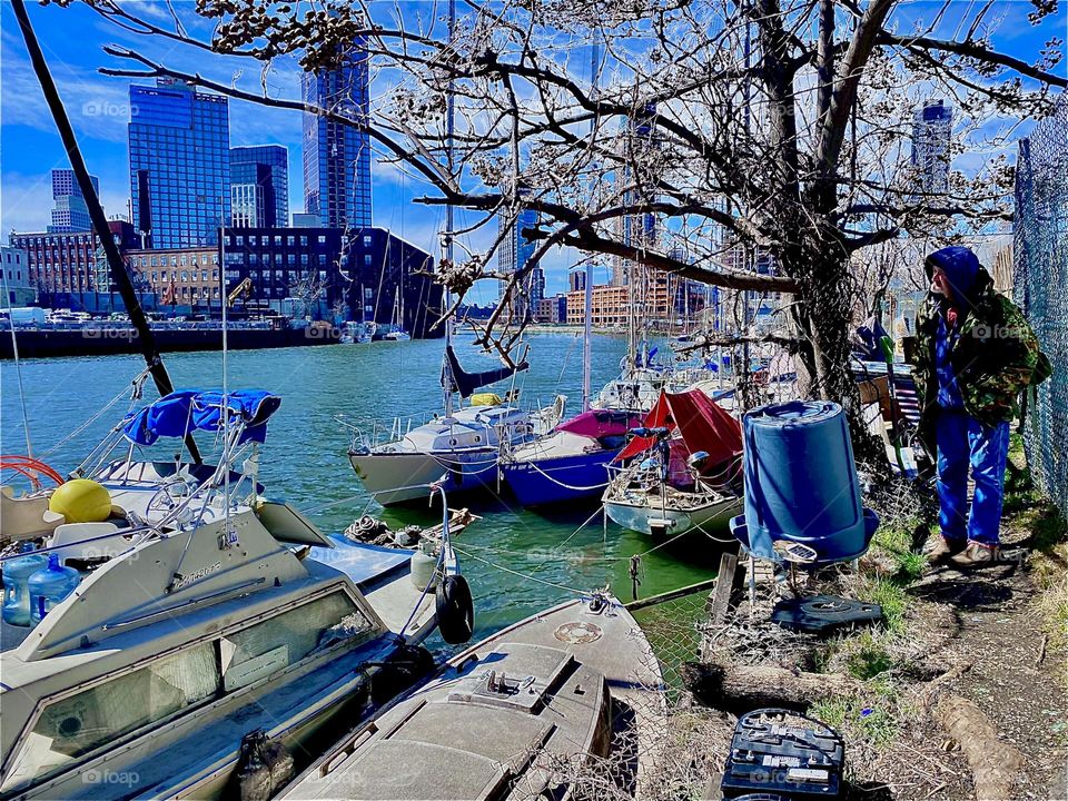 “Newtown Creek” by the “Pulaski Bridge” in LIC, Queens is one of the best places to be in the “Big Apple” in terms of location, idyllic picturesque sights and naval specialties as can be seen in the variety of boats here. 2023. Hypnotic Productions