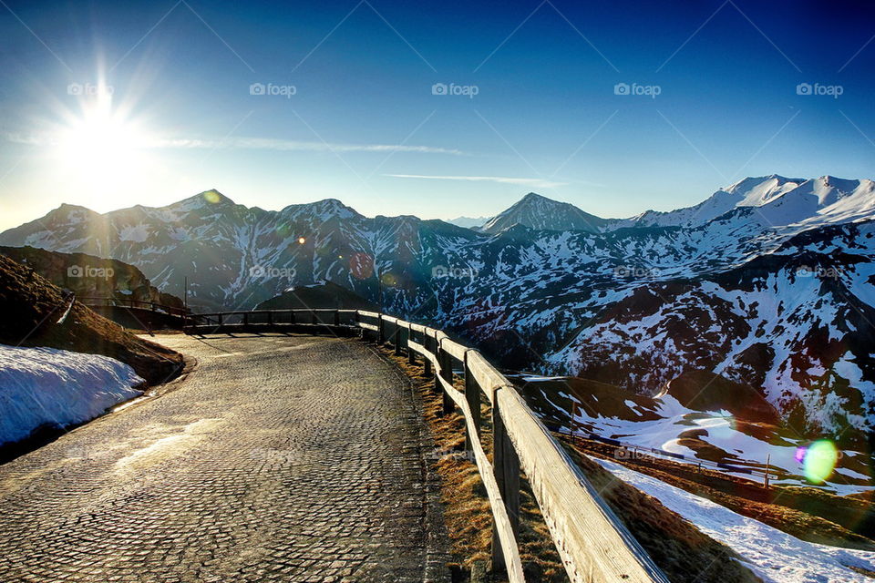 Scenics view of road by mountain